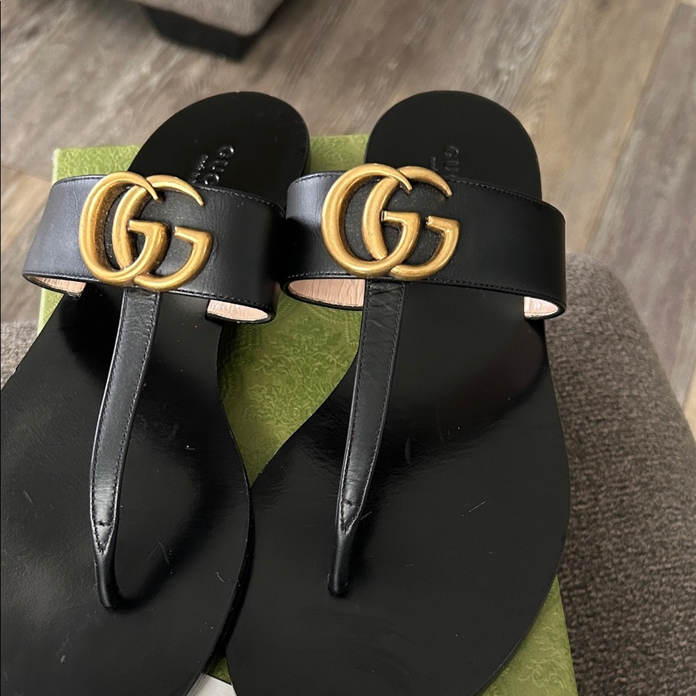Gucci Black Thong Sandals with Gold GG Emblem